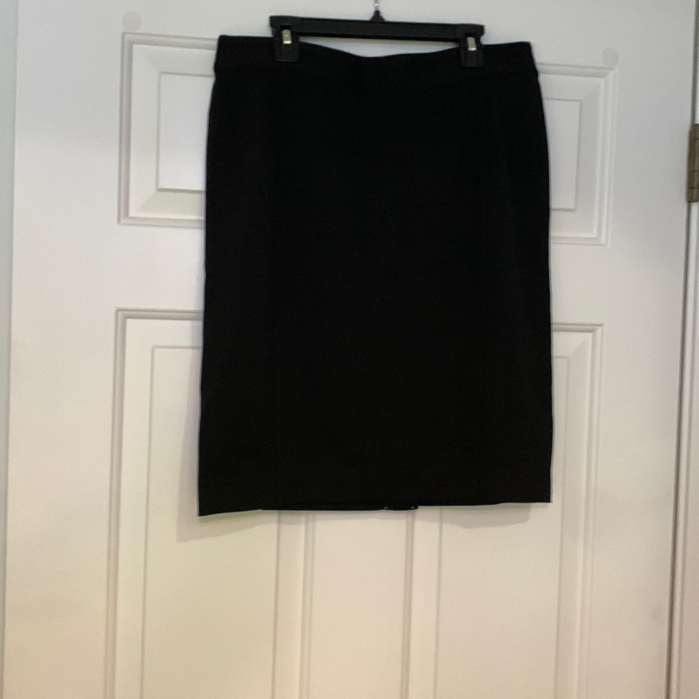 Black skirt tags still on